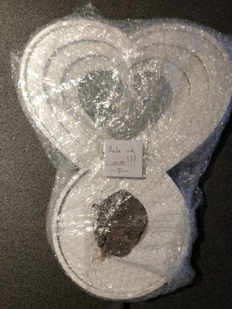 Heart Beacon packaged for transport — Made with Love