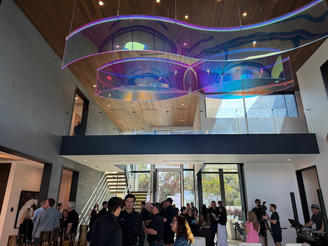 IBS 2026 — crowd event with sculpture overhead