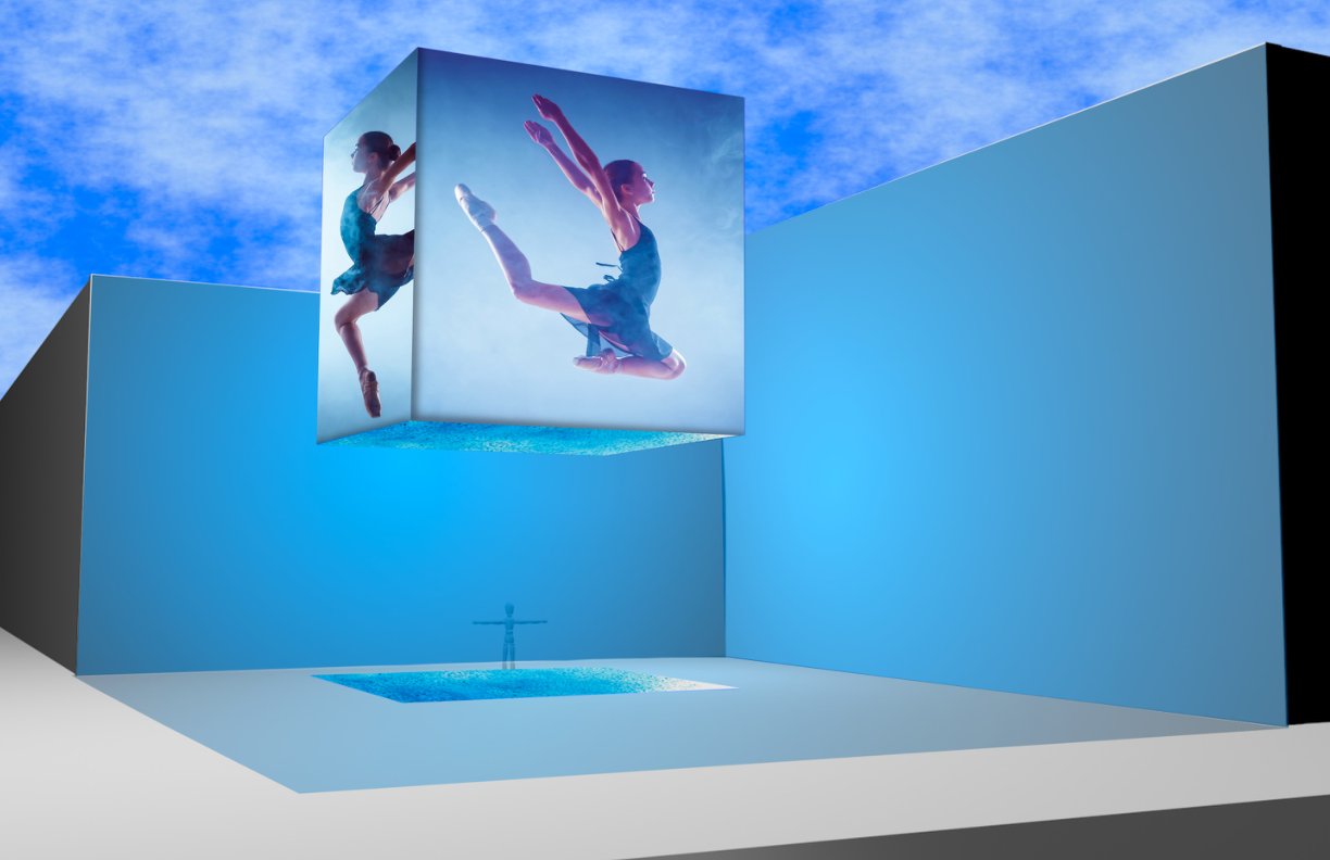Ballet dancer displayed on theCube with blue light wash