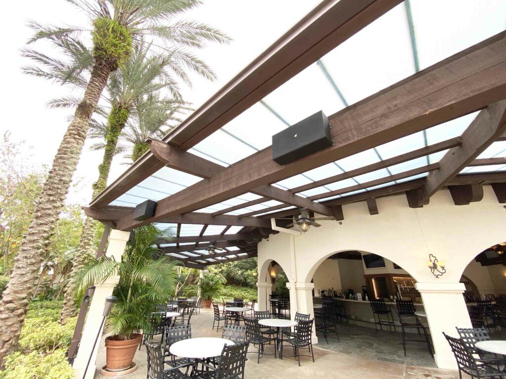 Covered dining area with ceiling speakers