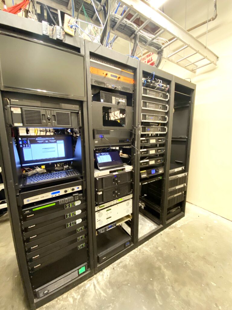 AV rack with Crown amplifiers and processing
